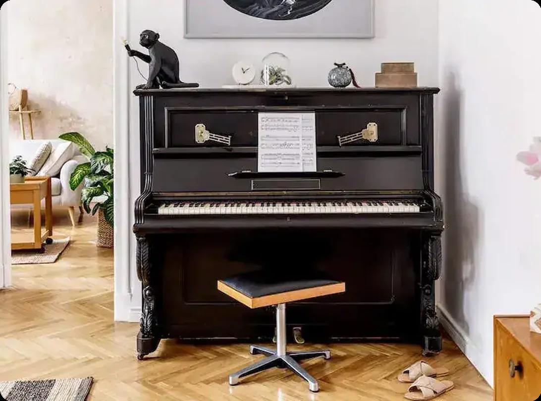 Upright piano in a living room with modern home décor