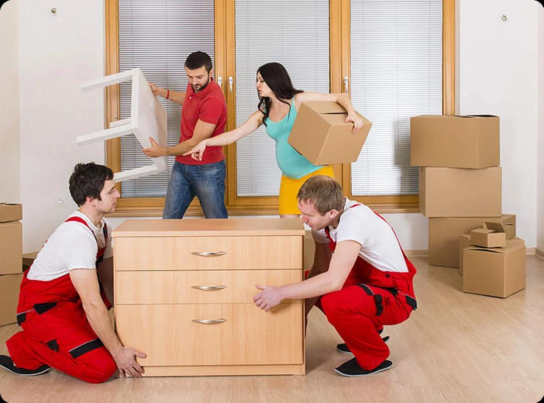 A homeowner unplugging an electronic device and labeling cords before movers arrive