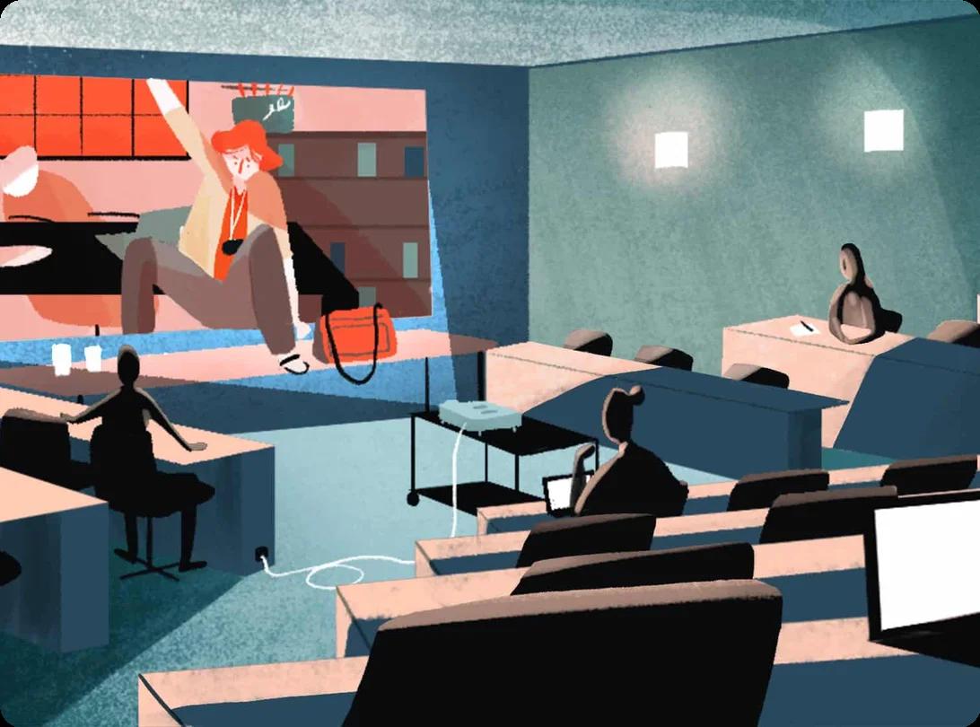 People sitting in front of a projector