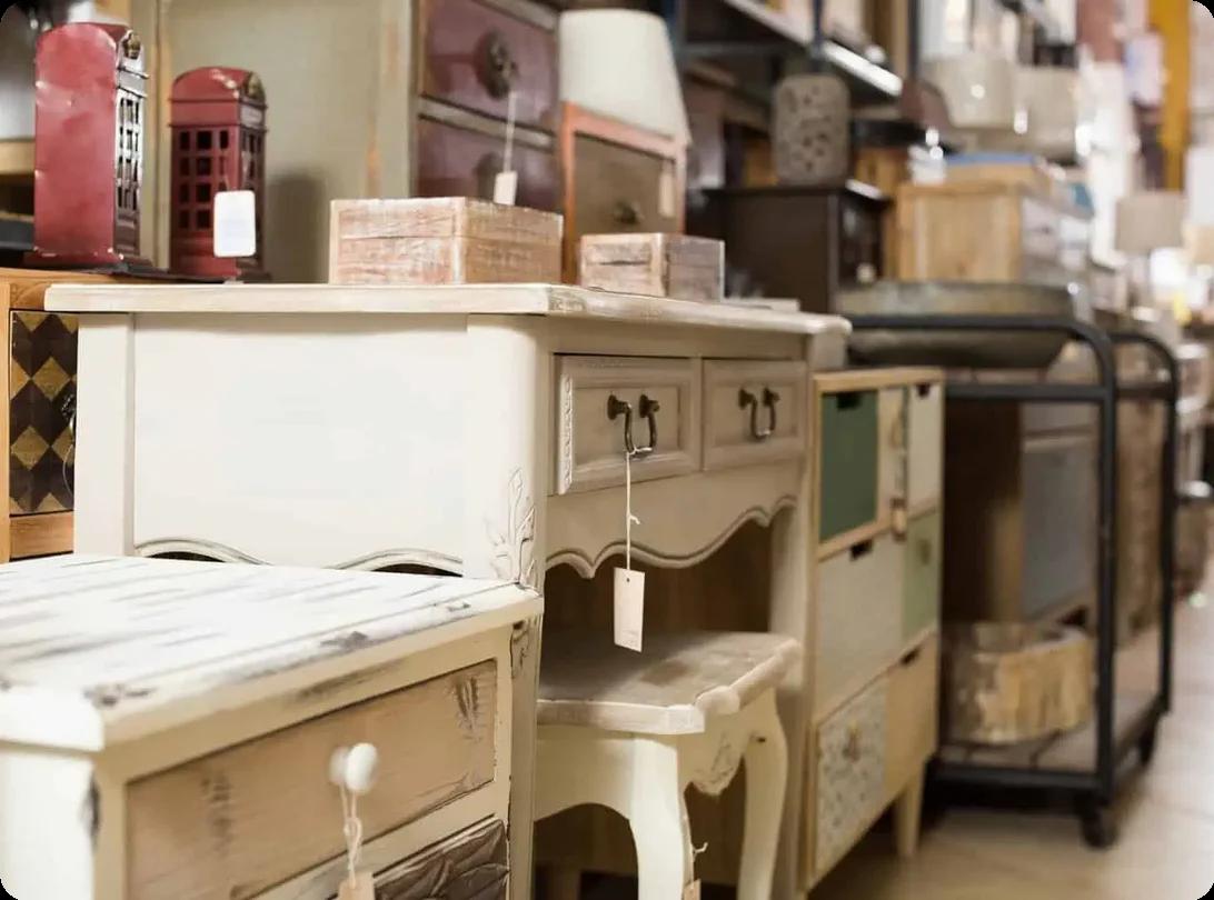 Used furniture displayed at a garage sale ready to be sold before a move