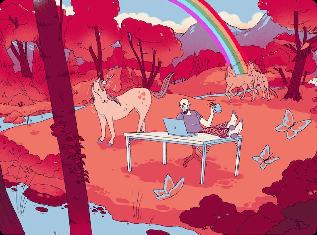A man on his computer in the middle of the forest