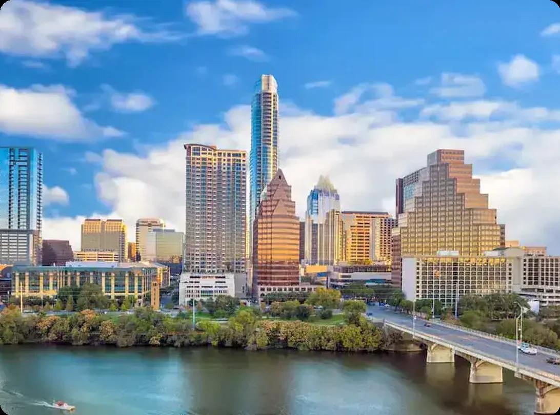 Austin, TX skyline overlooking Lady Bird Lake on a clear day