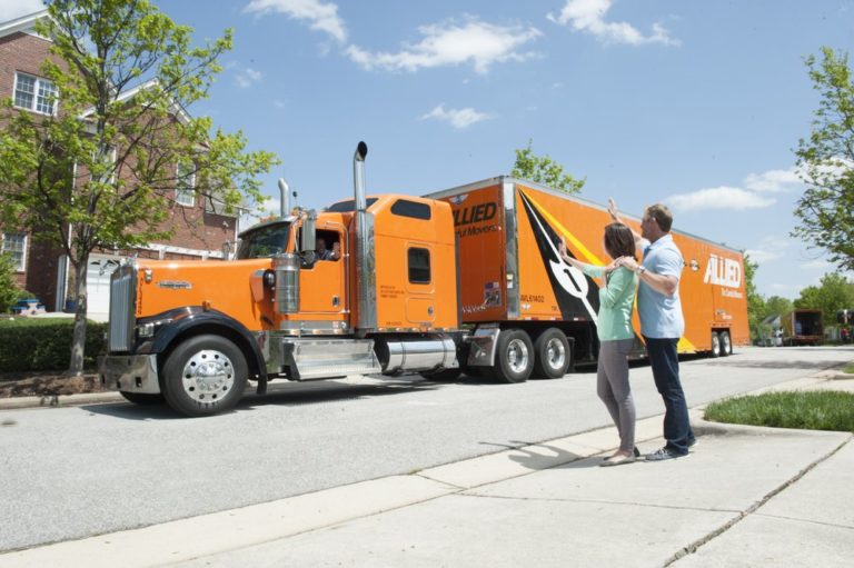 Couple pointing at Allied Van