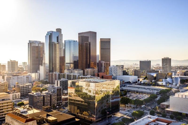 A clear day in Los Angeles, CA, featuring the skyscrapers of the downtown district.