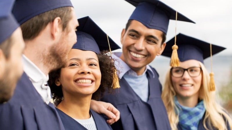 College graduates smiling