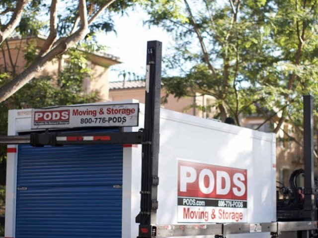 Storage Container parked outside of a home