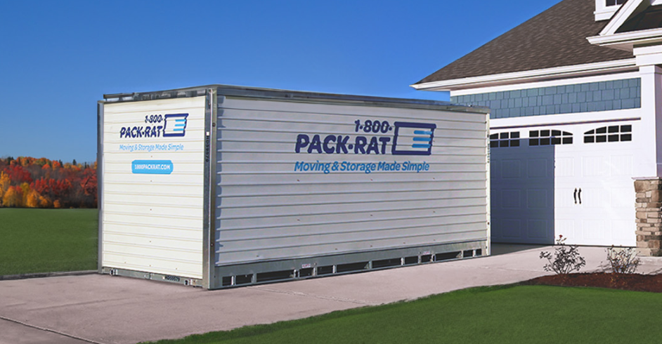 Mover loading a 1-800-PACK-RAT container